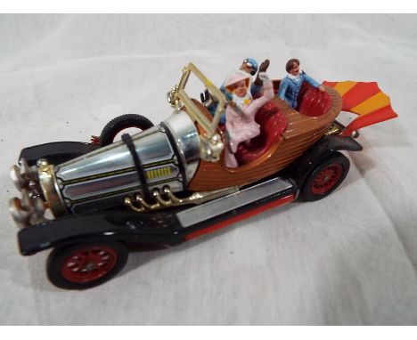 A Corgi diecast model Chitty Chitty Bang Bang, chrome, brown and red body, three figures, unboxed # 266
