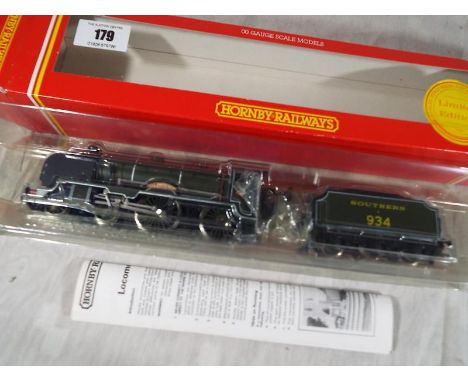 Model railways - a Hornby OO gauge locomotive and tender 4-4-0 schools class St Lawrence, op no 934 Southern Region, boxed, i
