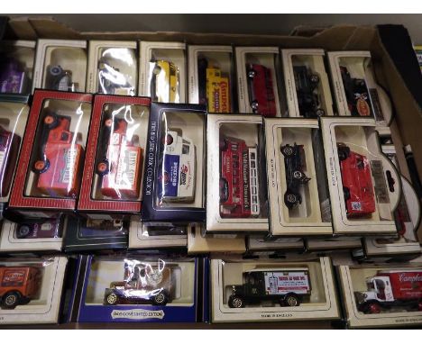 Approximately 27 Days-Gone model motor vehicles by Lledo, all mint boxed - Est £30 - £40