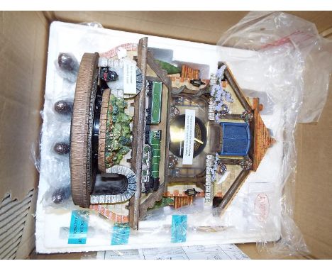 A Bradford Editions Flying Scotsman cuckoo clock entitled Memories of Steam with certificate of authenticity, boxed and unuse