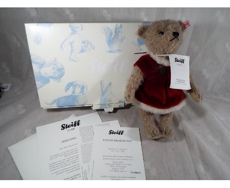 A Steiff Romy mohair bear, sand colour, dressed, issued in a limited edition of 1500, Button in ear, white tag, 25 cm (h) box