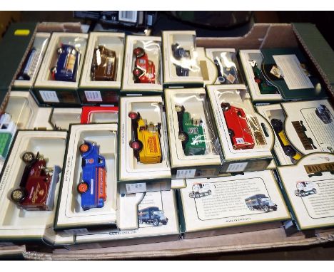 Approximately 28 Days-Gone model motor vehicles by Lledo, all mint boxed - Est £30 - £40