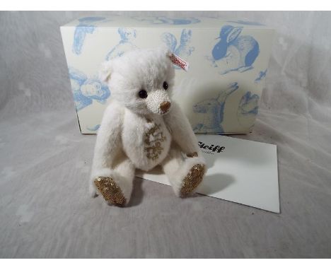 A Steiff Lumia 25 Alpaca bear, white, Button in ear, white tag # 035272 issued in a limited edition with certificate of authe