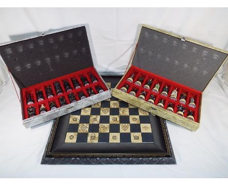 Lord of The Rings by Eaglemoss - a chess set, lead pieces depicting film characters, both sets in presentations boxes, with a