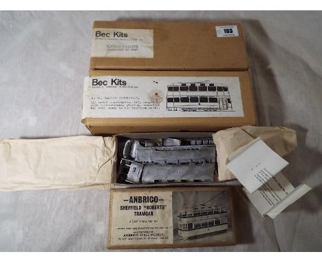 Three OO gauge white metal kits comprising Anbrico Scale Models Sheffield 'Roberts' Tramcar and two Bec Kits No 16 Glasgow Co