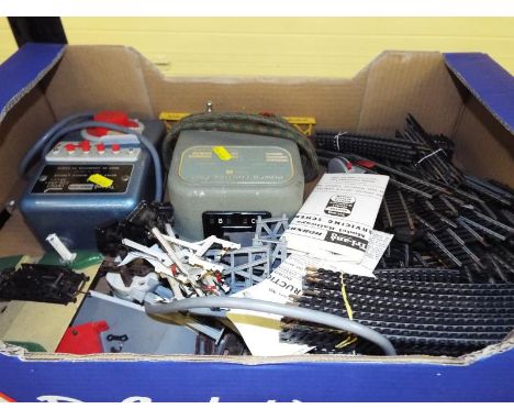 Model Railways - a quantity of OO gauge Hornby and Lima twin-rail track, two power controllers, diecast signals and some scen