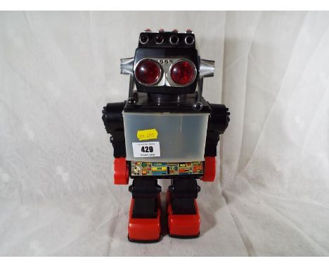 A vintage robot with rotating light picture panel 30cm (h)