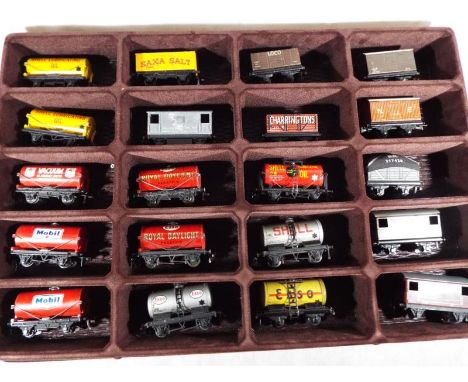 Model railways - 20 Hornby Dublo and Trix OO gauge items of rolling stock, predominantly tin-plate and die cast, in display c