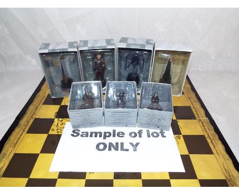 Lord of The Rings by Eaglemoss - 51 lead chess pieces depicting film characters, black playing pieces, predominantly excellen