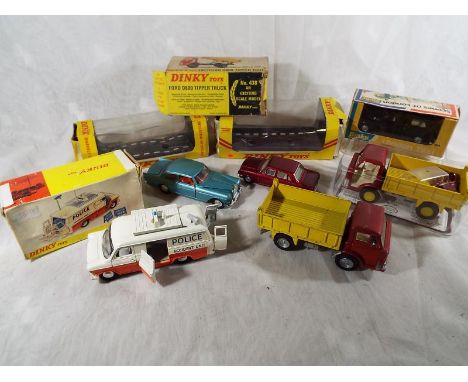 A small collection of vintage Dinky model motor vehicles to include Police Accident Unit #287, near mint but lacking road sig