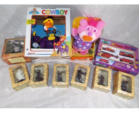 Seven Lord of the Rings figures, a battery operated cowboy, a four piece diecast City Team pack of cars and a Sing-a-Long Tot