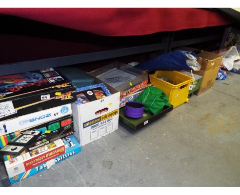 A very large mixed lot of toys to include good quality dressed dolls, bagatelle, board games, Zone 40 gaming console, Chad Va