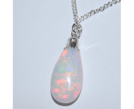 An opal pendant, the polished opal weighing 5.8ct and from the Ethiopian Welo Mine, on sterling silver neck-chain