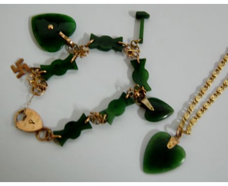 A Chinese yellow metal necklace with jade set pendant; and one other 9ct gold and spinach jade charm bracelet with safety cha