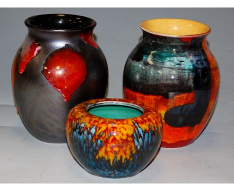 A Poole studio pottery vase; together with two other similar (3)