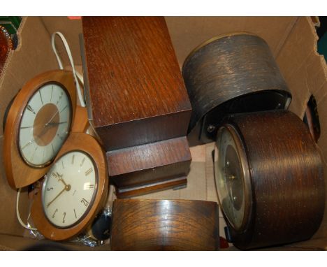 An Art Deco oak cased mantel clock,  together with various other oak cased mantel clocks and alarm clock etc