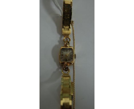 A yellow metal cased ladies cocktail watch, having manual wind movement, on unmarked yellow metal bracelet, gross weight 23.6