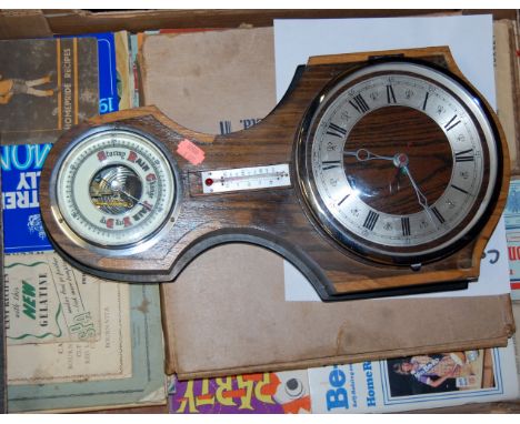 A mixed lot to include; early 20th century oak cased clock barometer, confectionary and baking magazines etc 