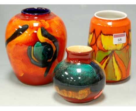 A Poole pottery Delphis pattern vase, shape No.83; together with two other Poole pottery vases (3)  Condition Report / Extra 