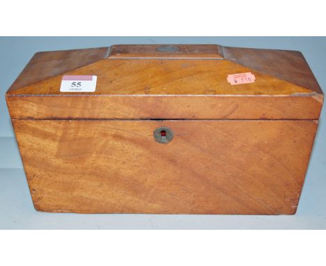 A Victorian mahogany tea caddy of sarcophagus form, lacking interior 