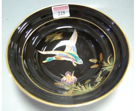 A Carltonware ribbed bowl decorated with a duck in flight 