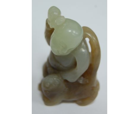A modern Chinese jade carving  Condition Report / Extra Information Small horizontal hairline to back of right hand ankle.
So