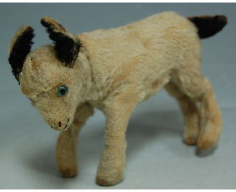 An early 20th century Steiff straw-filled lamb 