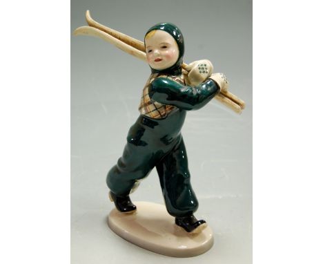 A Wien of Austria ceramic figure of a young skier, numbered verso 2062 Condition Report / Extra Information Ski's have been b