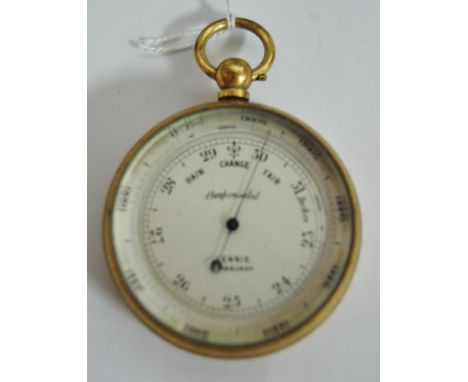 An early 20th century gilt metal cased pocket barometer, the silvered dial signed Lennie of Edinburgh 
