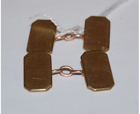 A pair of gents 9ct gold engine turned *cufflinks*, 8.7g