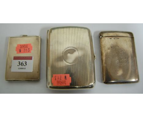 A 1930s engine turned silver pocket compact; together with a silver cigarette case of hipped form; and one other (3)