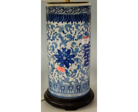 A modern Chinese style blue and white table lamp with pleated shade 