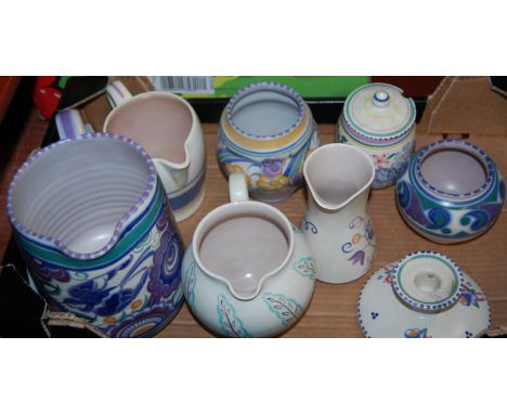 A collection of assorted Poole pottery to include; Elizabeth II commemorative jug