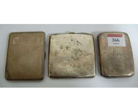 An early 20th century engine turned silver cigarette case; and two other examples (3)