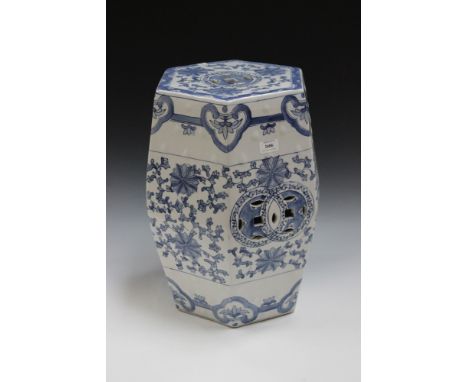 A modern blue and white ceramic garden seat of hexagonal form, height approx 47cm.
