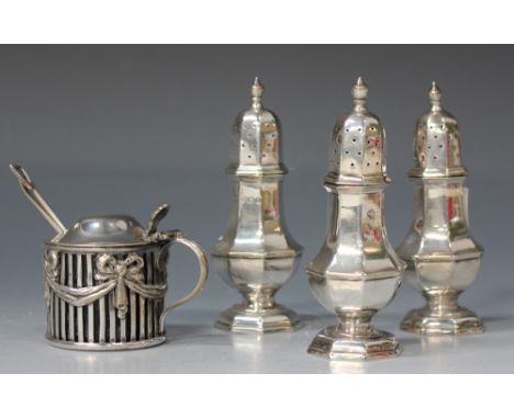 A set of three late Victorian silver pepper casters of octagonal baluster form, Sheffield 1898 by William Hutton & Sons, toge