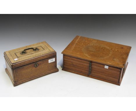 A George III mahogany tea caddy, the hinged lid with chequer stringing and crossbanded borders, width approx 26.5cm, together