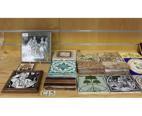 A large collection of ceramic tiles, 19th Century and later, including a Minton tile works 'Heart of Midlothian, Jeanie and t