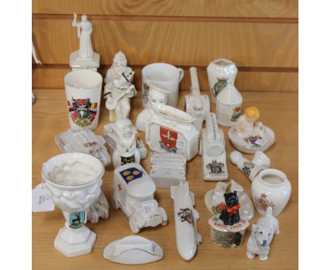 A collection of crested china, including a W.H. Goss model of 'The Melrose Cup', three models of tanks and a model of the 'La