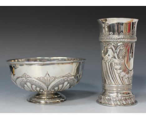 A late Victorian silver rose bowl, embossed with stylized scallop shells and 'C' scroll decoration, on a circular foot, Londo