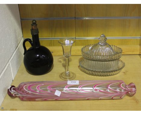 A Nailsea glass rolling pin, late 19th Century, with pink and white combed detail, length approx 43cm, together with a brown 