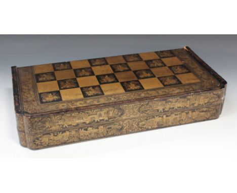 A Chinese export lacquer folding games board, mid-19th Century, the exterior chess board decorated with gilt figures within d