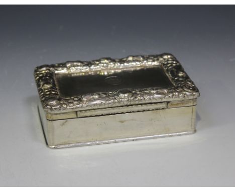 An early Victorian silver large rectangular Officers' Mess table snuffbox, the hinged lid cast in relief with a heavy border 