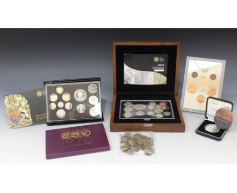 Three United Kingdom year-type specimen proof coin sets, comprising 1970, 2009 and 2011 Executive set, a New Zealand proof do