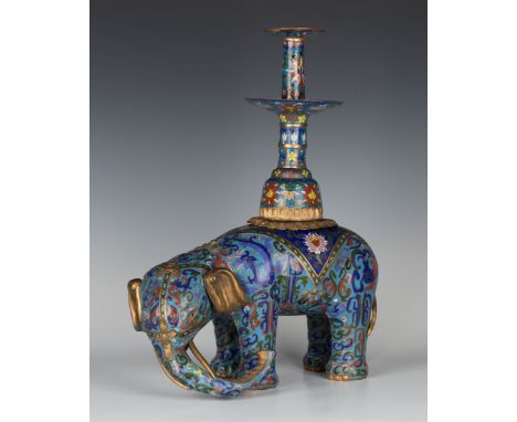 A Chinese cloisonné elephant candlestick, late Qing Dynasty, covered in polychrome archaistic scrolls, on a turquoise ground,