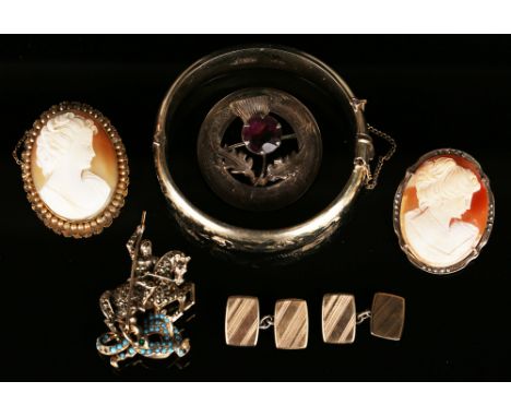 A marcasite and pale blue gem set brooch, designed as St George slaying the dragon, length approx 5cm, two oval shell cameo b