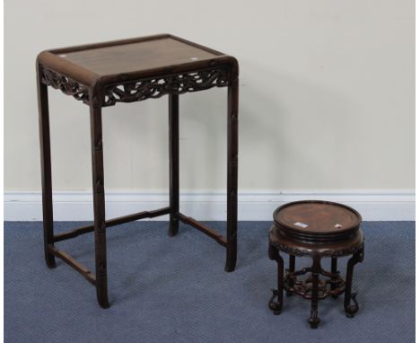 A Chinese hardwood jardinière stand, late 19th/early 20th Century, the circular top with burr inlaid panel, above a scroll ca