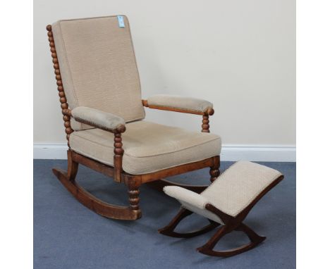 An early 20th Century bobbin turned fruitwood rocking armchair with shaped supports (alterations and restoration), together w