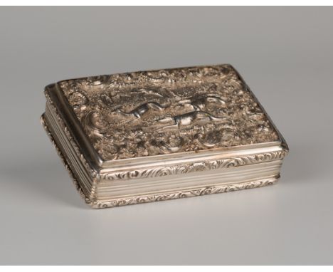 An early Victorian silver rectangular snuffbox, the hinged lid decorated in relief with a scene of three hounds chasing a sta