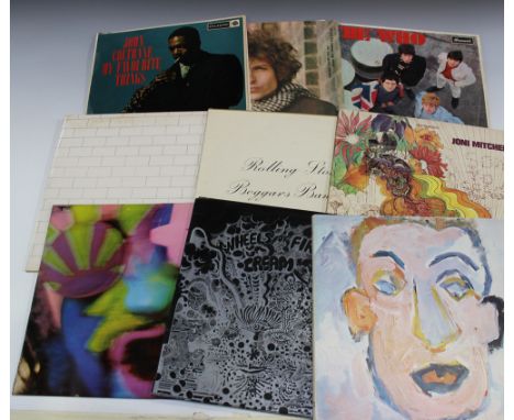 A small collection of LP records, including early pressings of 'Beggars Banquet' by The Rolling Stones, 'Blonde on Blonde' by